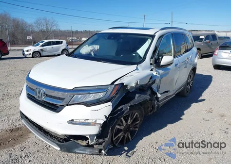 2021 Honda Pilot Awd Touring 7 Passenger z USA, uszkodzony, nr VIN 5FNYF6H65MB091805